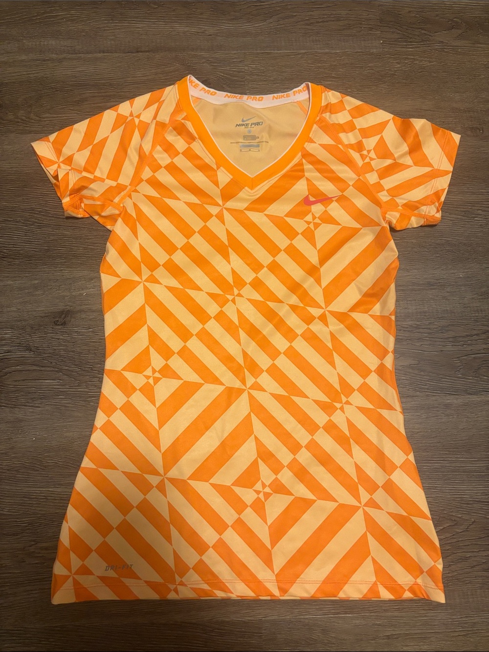 women’s orange nike dri fit shirt